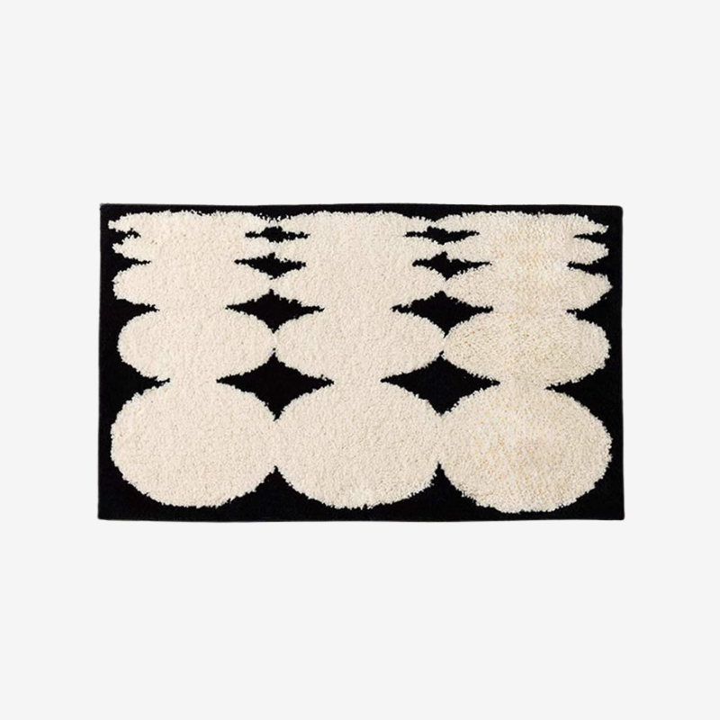BLACK BACKGROUND BATH MAT